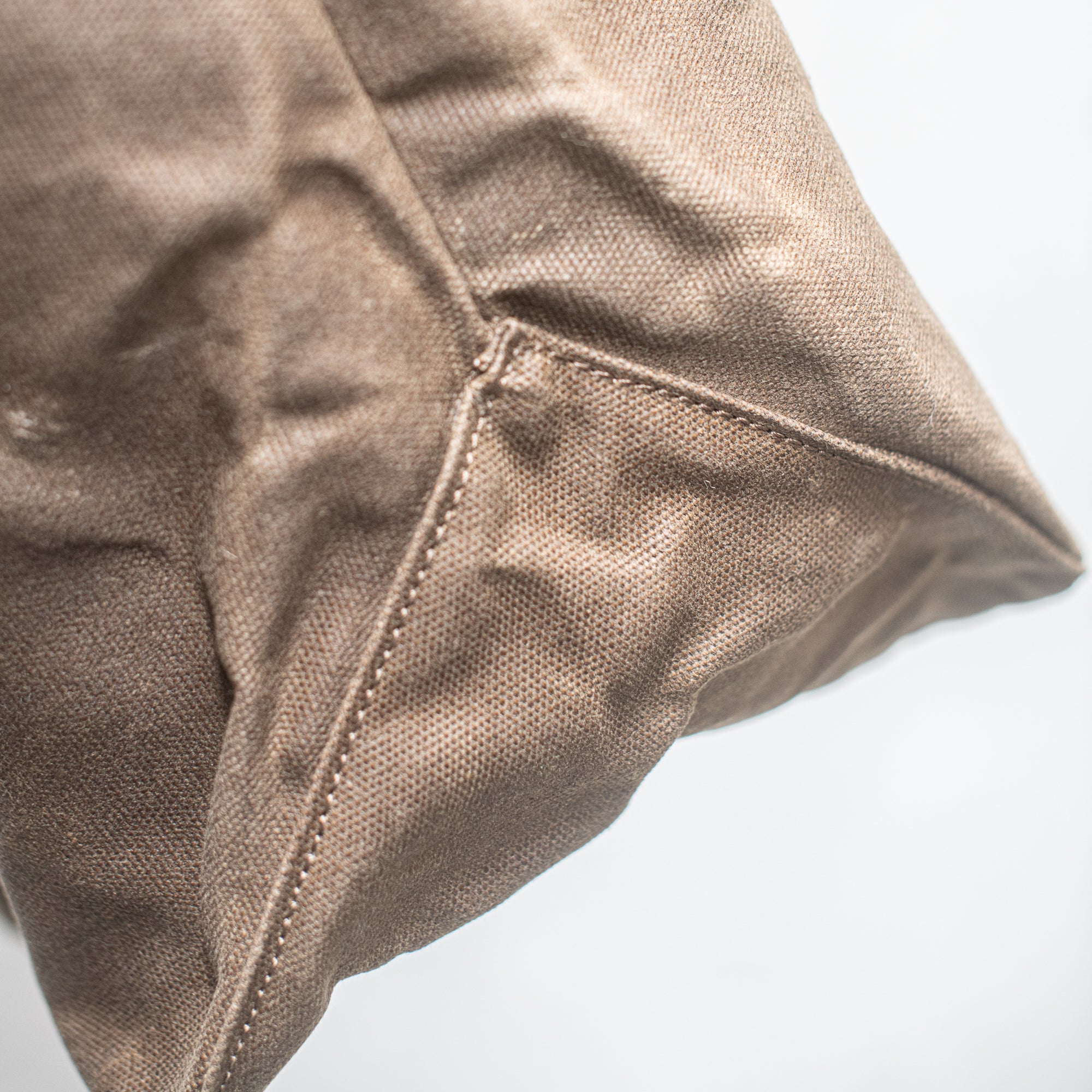 Durable Waxed Canvas Carry All by Heaven in Earth, designed for everyday use with a rugged, water-resistant waxed canvas construction. This versatile bag features sturdy handles and a spacious interior, perfect for carrying everything from groceries to gym gear, offering both style and practicality for on-the-go living.