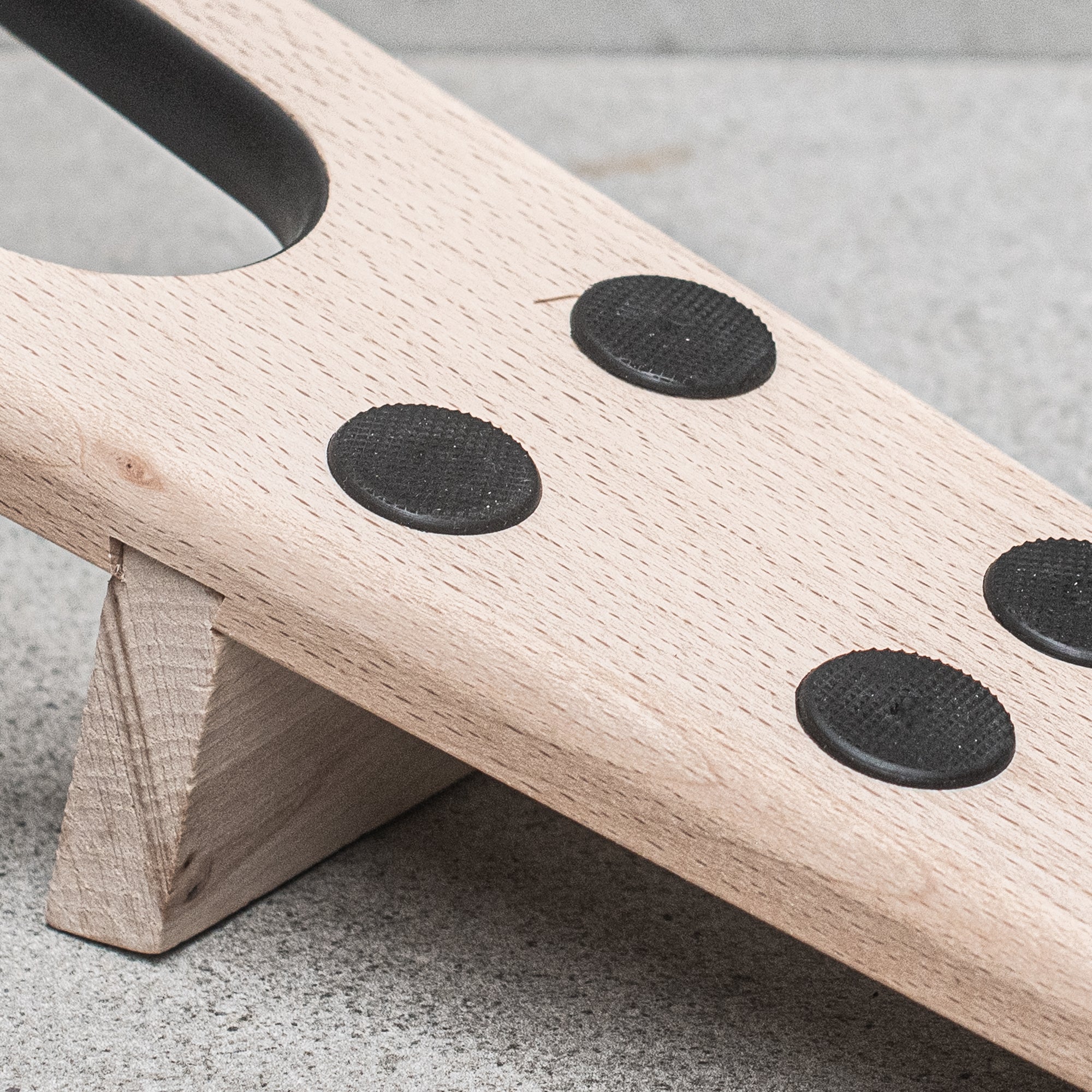 German-made FSC-certified wooden bootjack, crafted from high-quality, sustainably sourced beechwood, designed for easy and efficient removal of boots with a sturdy, ergonomic design