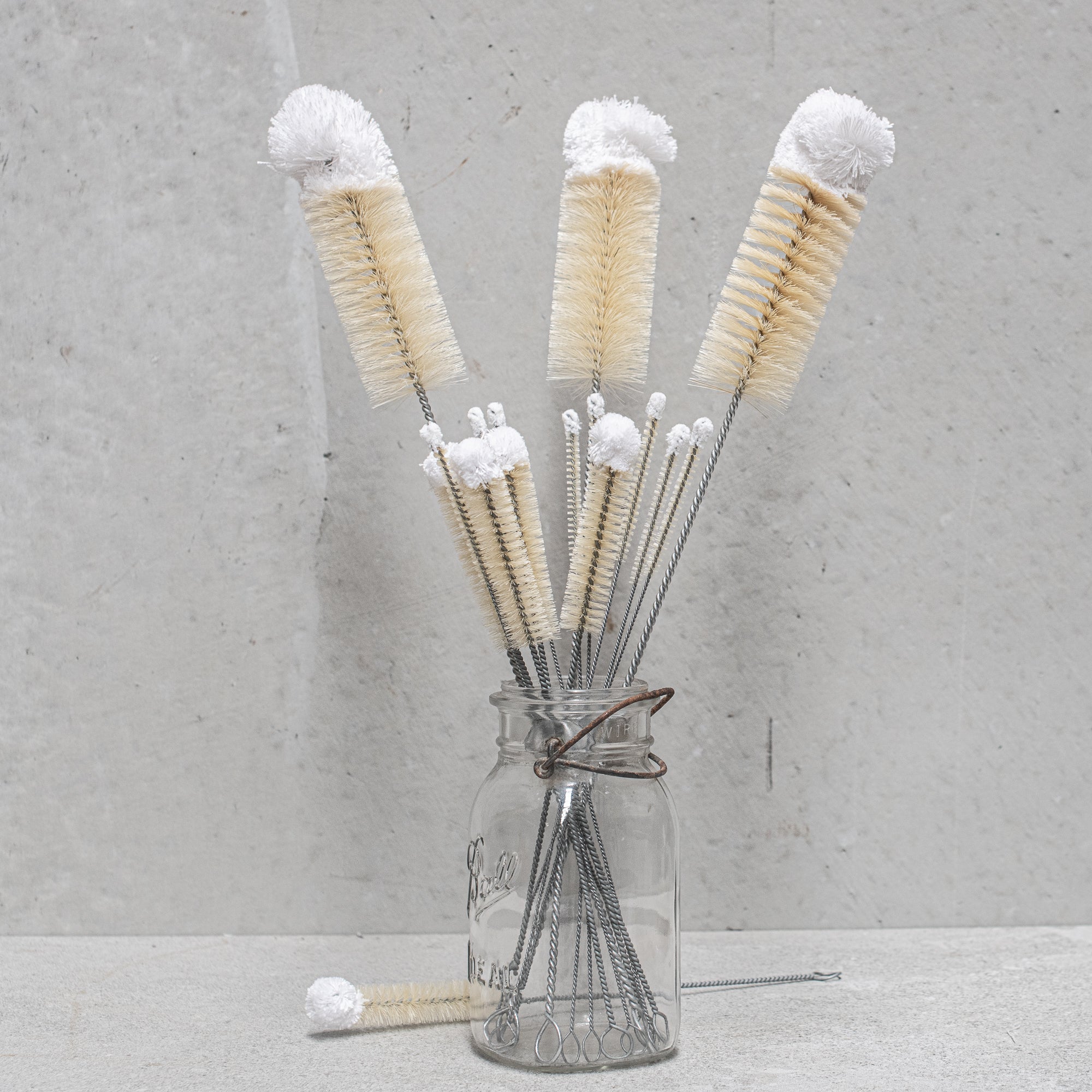 German-made natural cotton wool top bottle brush, featuring soft, gentle cotton fibres and a durable handle, ideal for cleaning delicate bottles and containers without scratching. 3 sizes