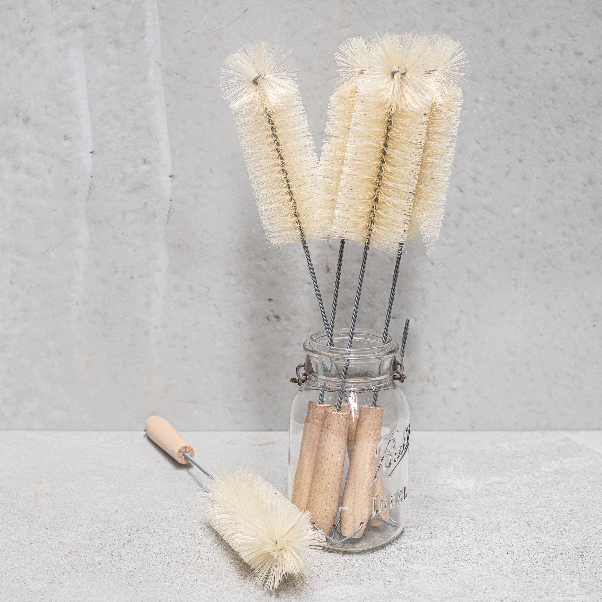 German-made bottle brush with natural fibre bristles and a sturdy wooden handle, designed for thorough cleaning of bottles and jars, offering durability and eco-friendly craftsmanship