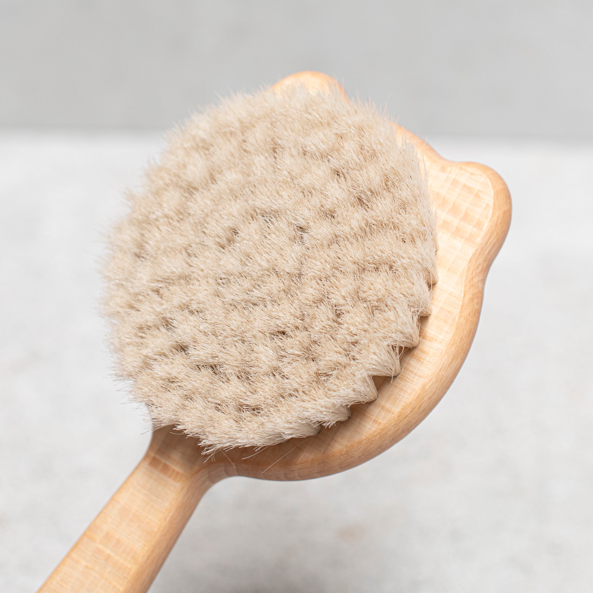 baby hair brush with beechwood handle and engraved cat design