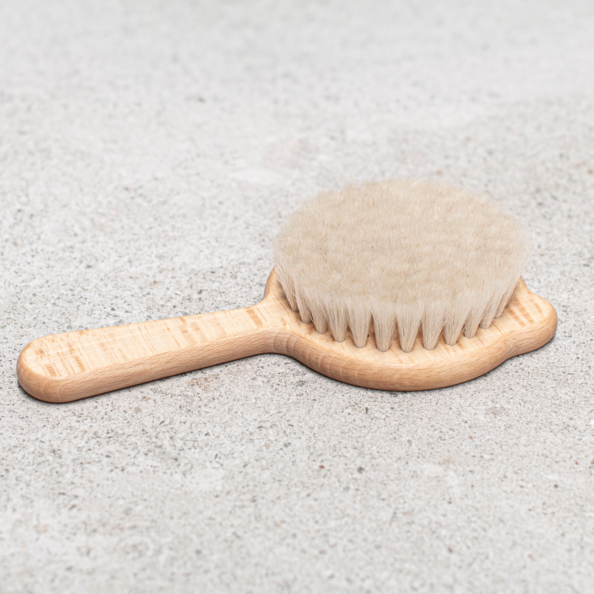 baby hair brush with beechwood handle and engraved cat design