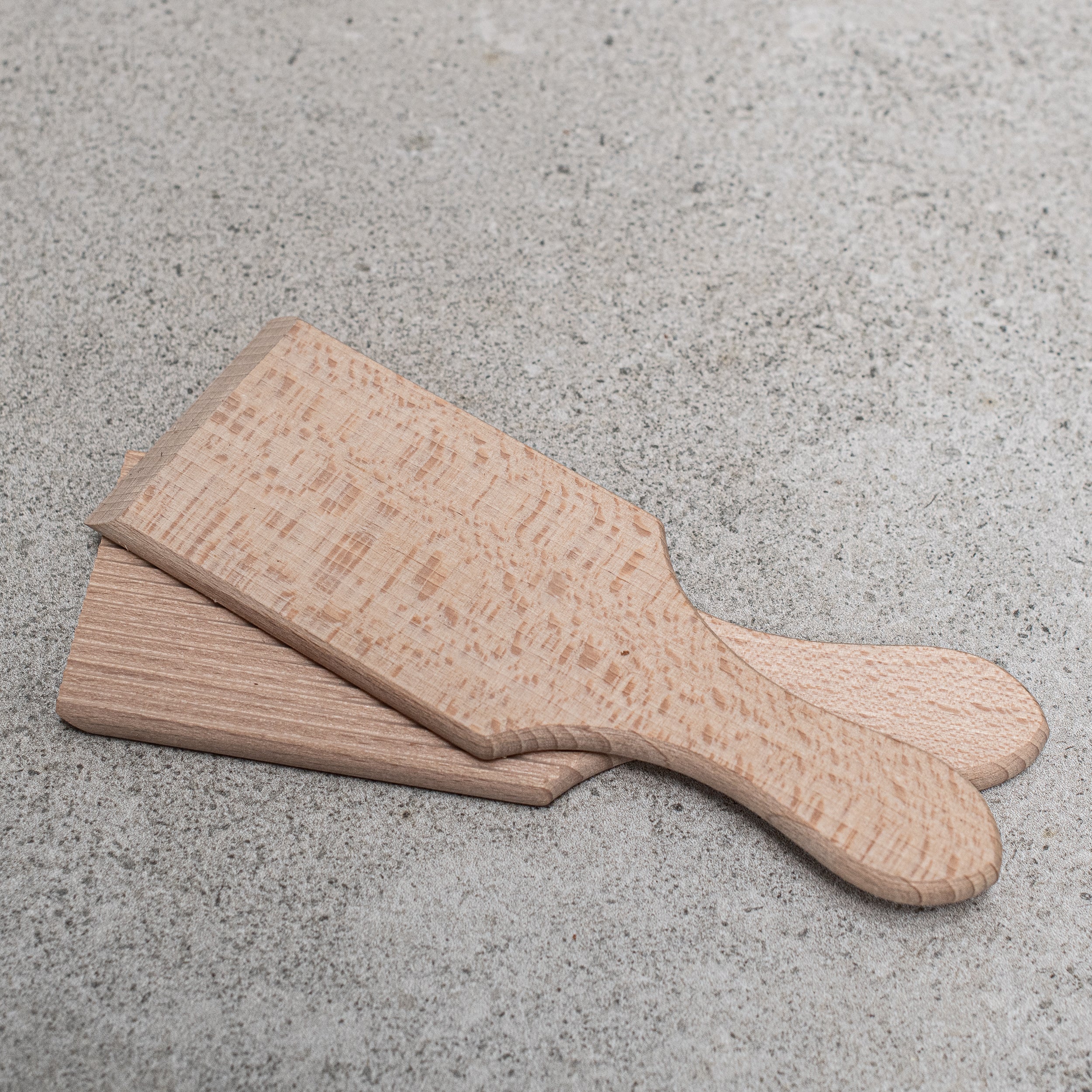 Butter German-made wooden butter making pats and moulds, crafted from high-quality wood with intricate designs, perfect for shaping and pressing homemade butter with traditional craftsmanship."