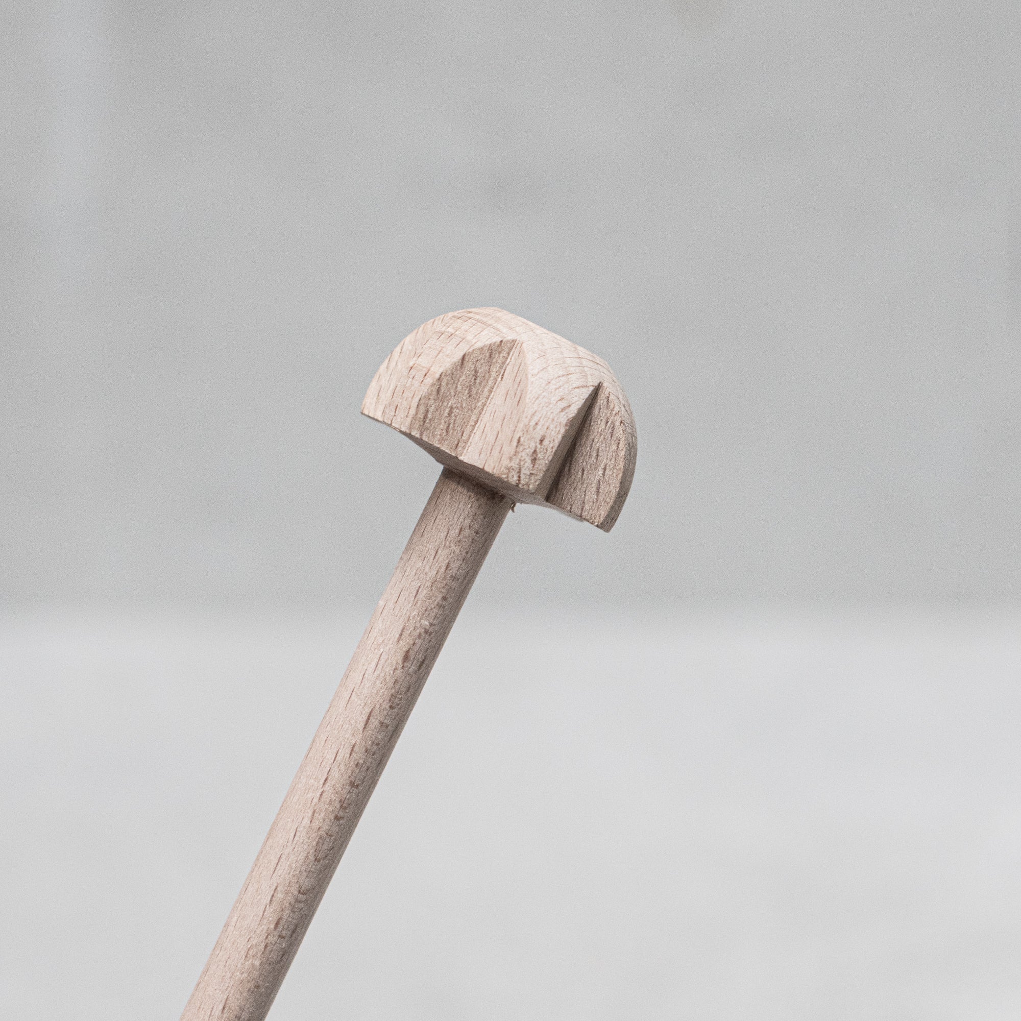 Children's wooden German-made cookset, crafted from durable, natural wood, featuring miniature kitchen tools like a spoon, whisk and tongs, designed for imaginative play and budding chefs.