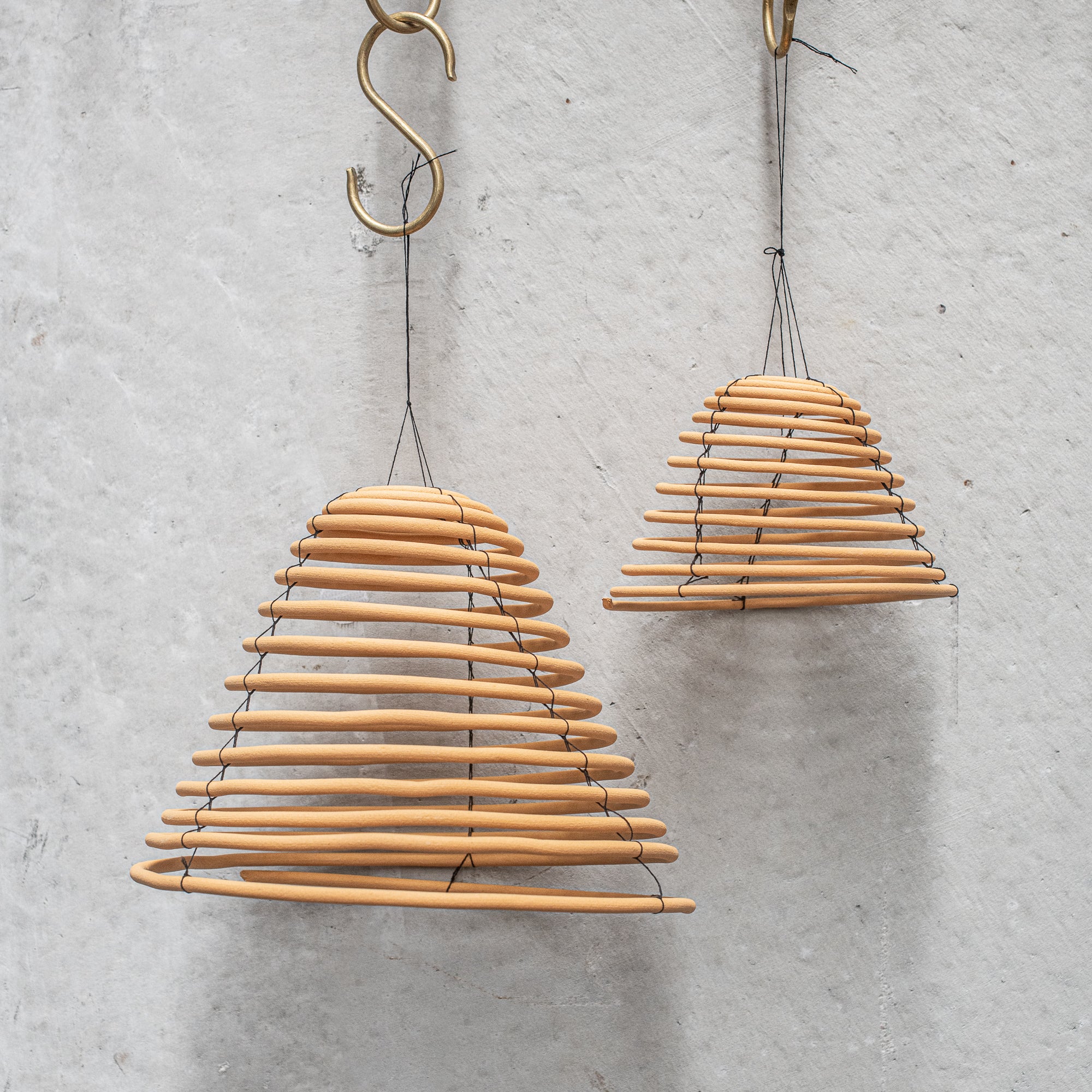 Natural citronella hanging chandelier, designed to gently repel insects while creating a warm, ambient glow with its elegant, rustic design—perfect for outdoor gatherings. Heaven In Earth