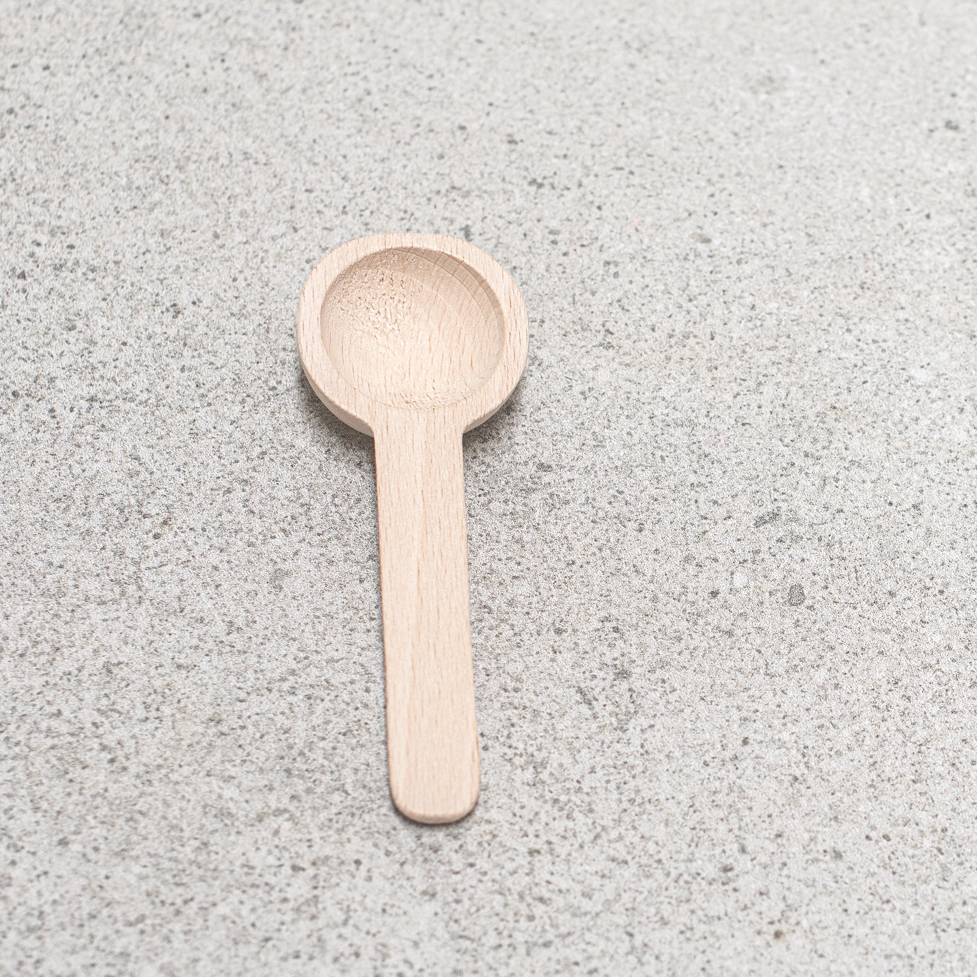 Wooden coffee scoop, made in Germany from eco-friendly materials, designed for precise measuring and a sustainable, stylish addition to your coffee routine