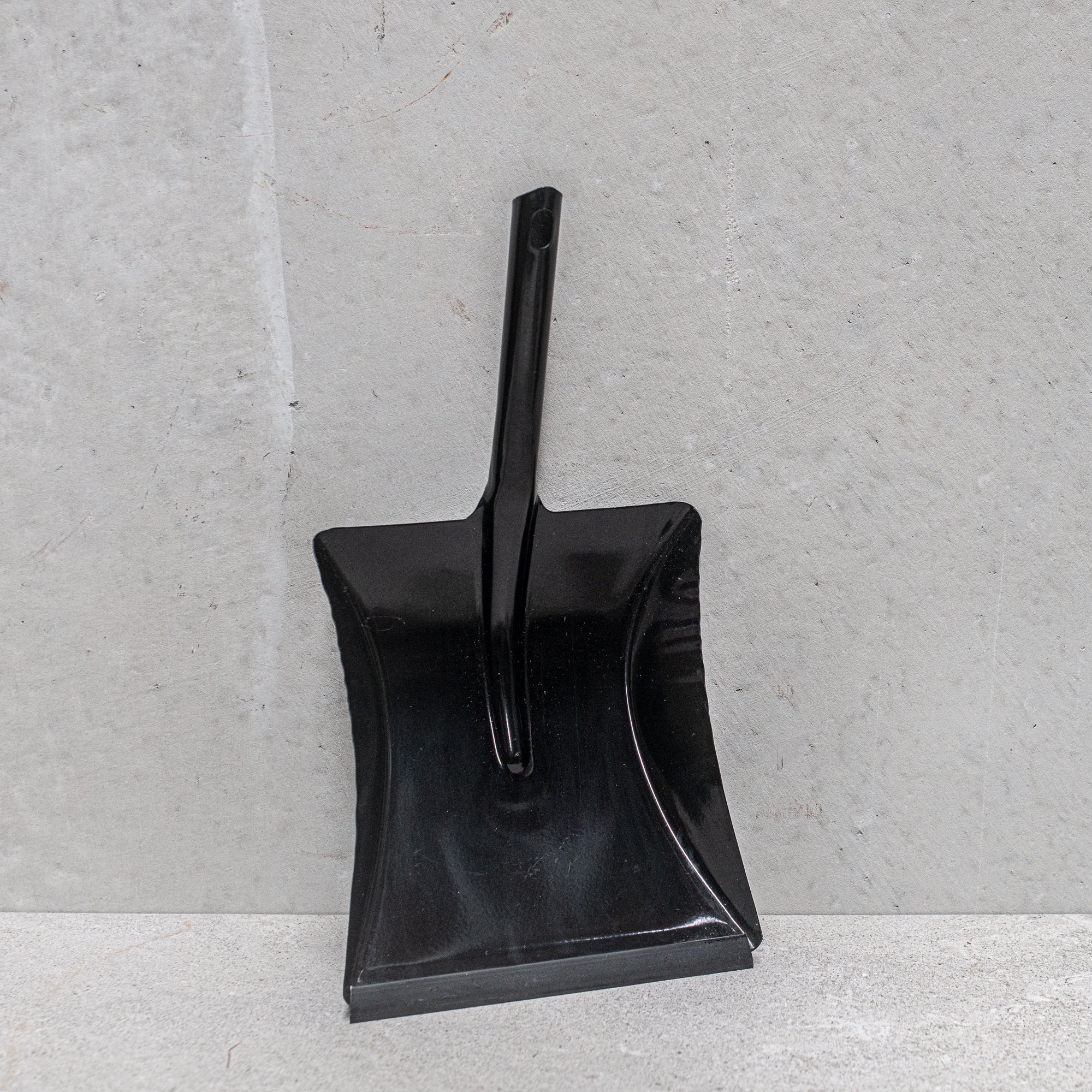 Heaven in Earth (HIE) German-made metal dustpan, available in black or white, featuring a sleek, durable design with a comfortable handle, perfect for quick and efficient cleanup while adding a modern, minimalist touch to your cleaning tools
