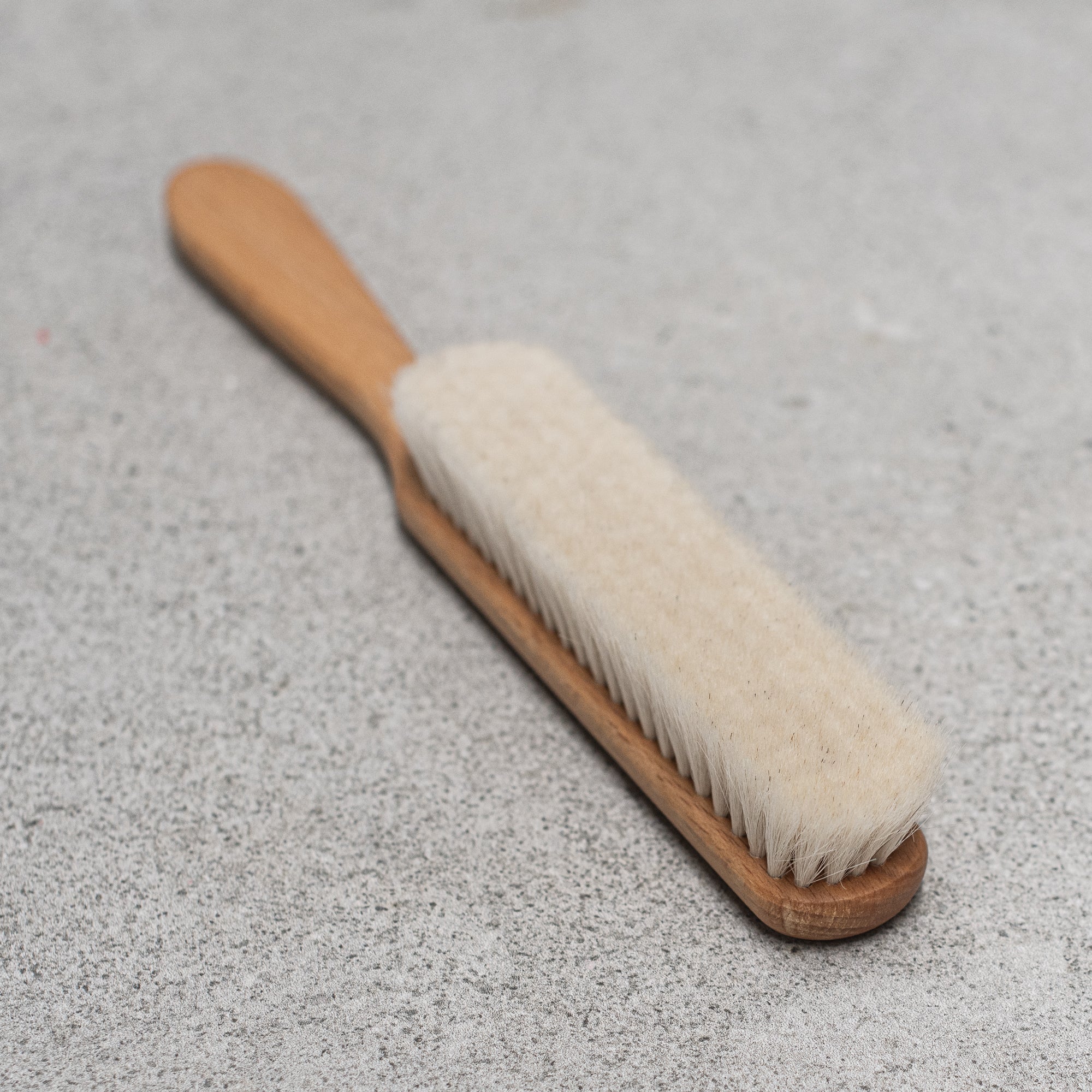 German-made wooden and goats hair dust brush by Kellerbürsten, featuring soft, natural bristles and a sturdy wooden handle, perfect for gently sweeping dust and debris from surfaces with precision and care. Heaven in earth (HIE)