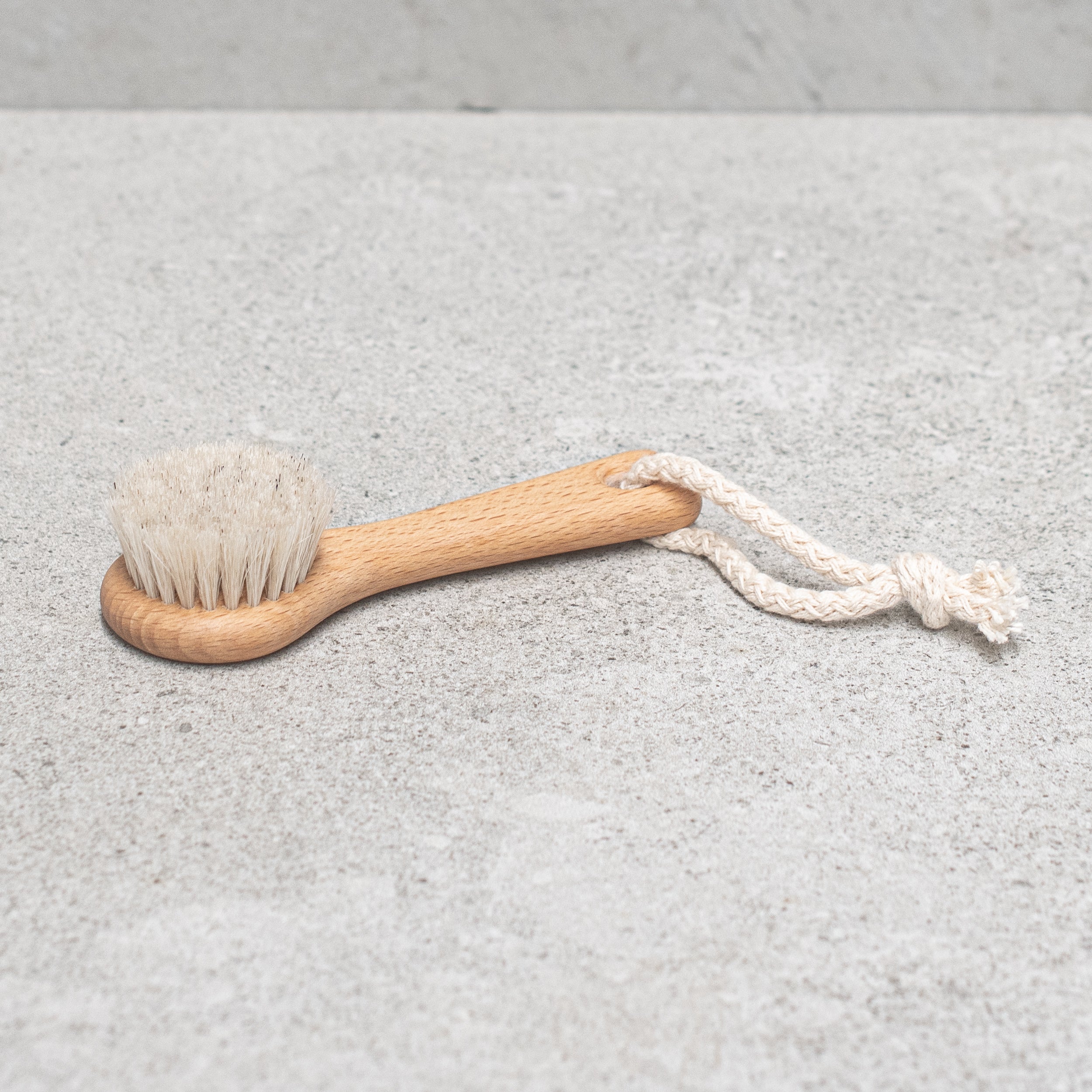 Heaven in Earth wooden and natural bristles face and body brush by Kellerbürsten, Germany, crafted with soft, eco-friendly bristles and a smooth wooden handle, designed for gentle exfoliation and effective skin care from head to toe