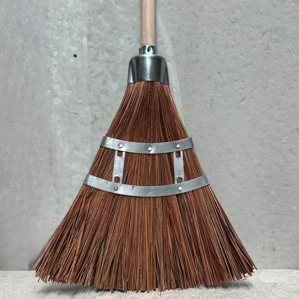 Palmyra outdoor broom with reinforced fan-shaped natural fibre head and timber handle, handmade in Germany by Keller Bürsten.