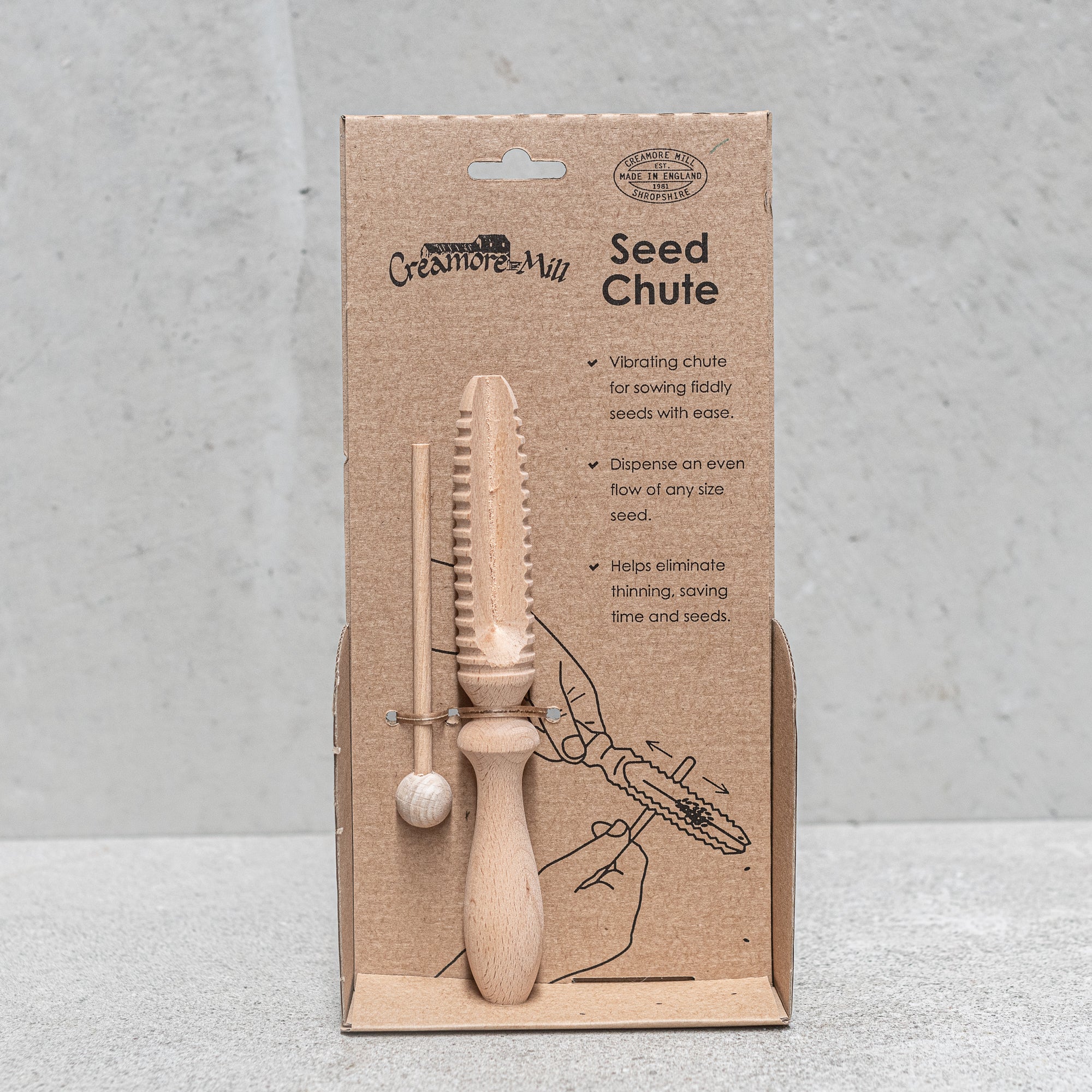 Heaven in Earth (HIE) Seed Chute by Creamore Mill, UK. Designed for efficient seed planting, this practical tool helps guide seeds into the soil with precision, reducing waste and ensuring even distribution. Made with a rustic, eco-friendly design, it's perfect for gardeners looking for an easy and effective way to plant seeds