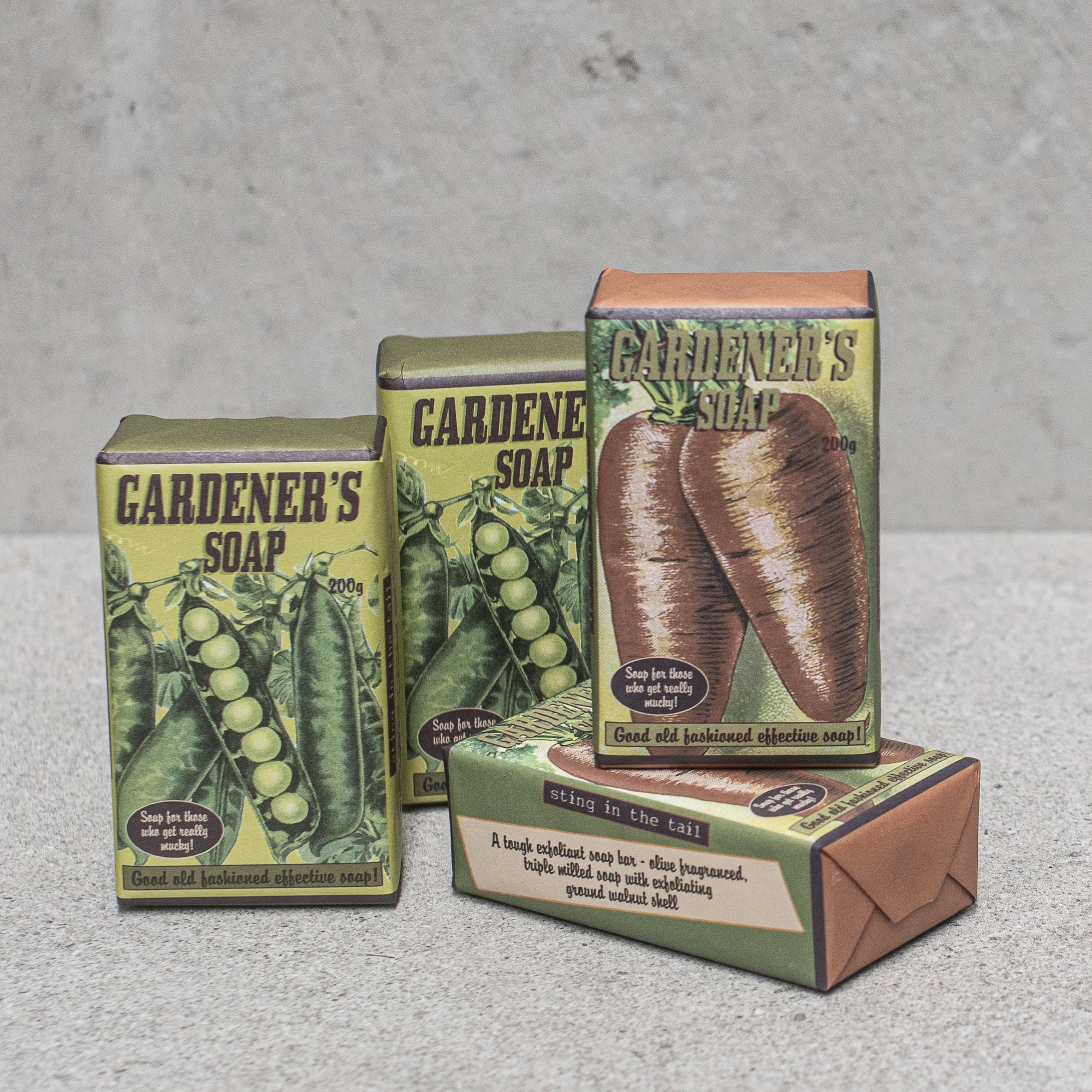 heaven in earth Gardeners Soap by sting in the tail uk - a classic with its gorgeous packaging and invigorating scent. This triple-milled soap contains ground walnut shell for gentle exfoliation, and comes in two charming, old-fashioned styles: Pea and Carrot.