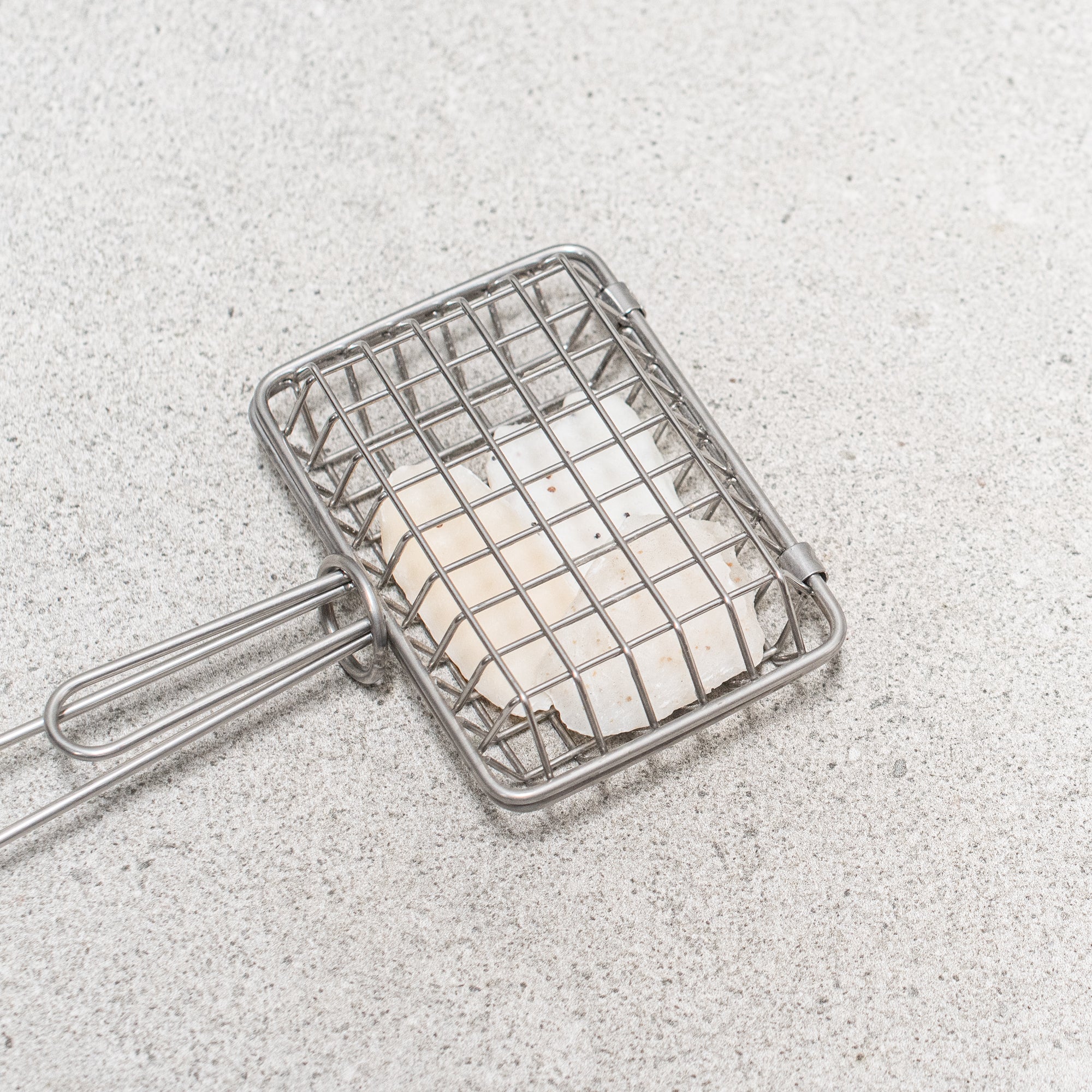 Heaven in Earth (HIE) stainless steel soap saver, designed to prolong the life of your soap by allowing it to dry properly between uses. Its sleek, durable design ensures your soap stays dry and lasts longer, making it a practical and eco-friendly addition to your bathroom