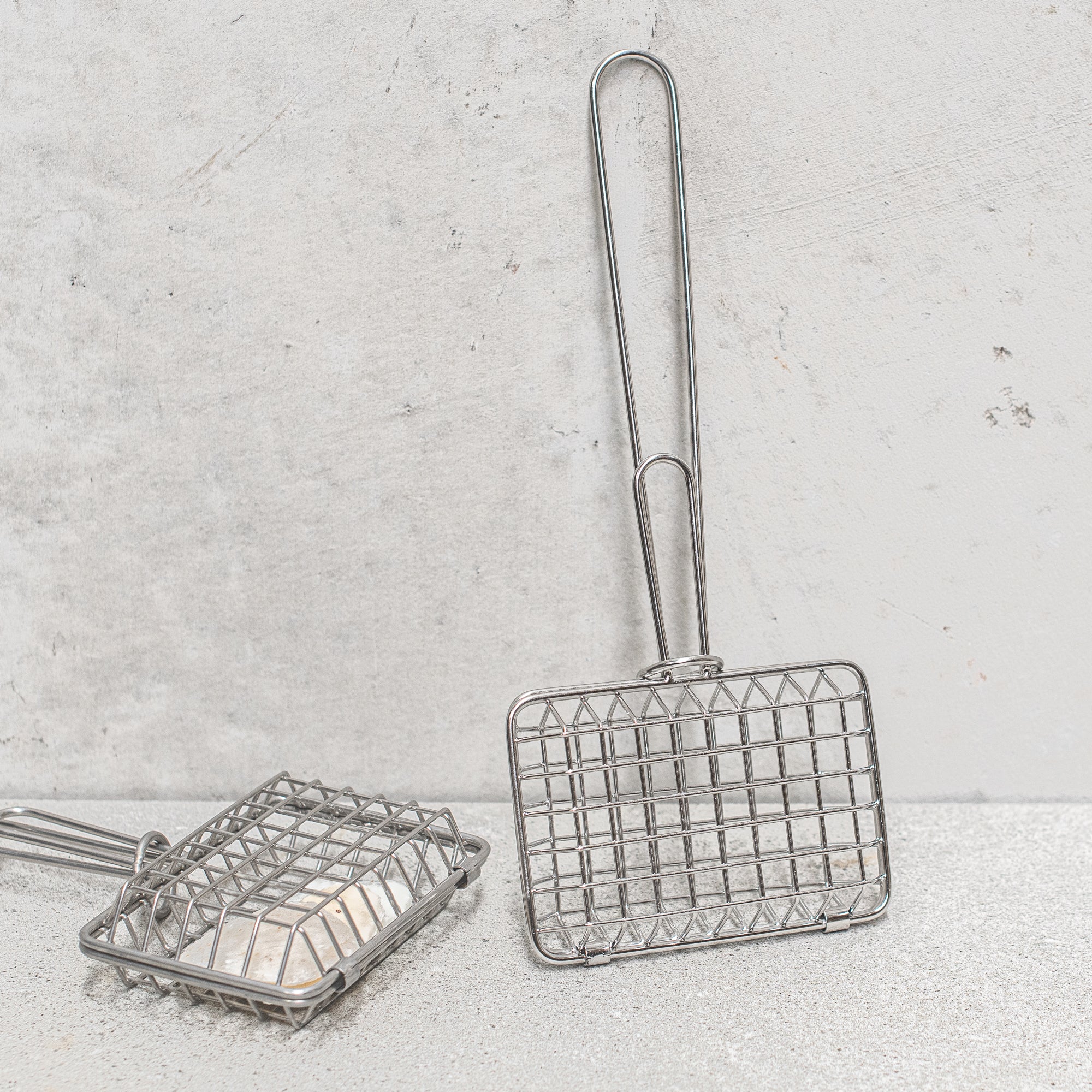Heaven in Earth (HIE) stainless steel soap saver, designed to prolong the life of your soap by allowing it to dry properly between uses. Its sleek, durable design ensures your soap stays dry and lasts longer, making it a practical and eco-friendly addition to your home