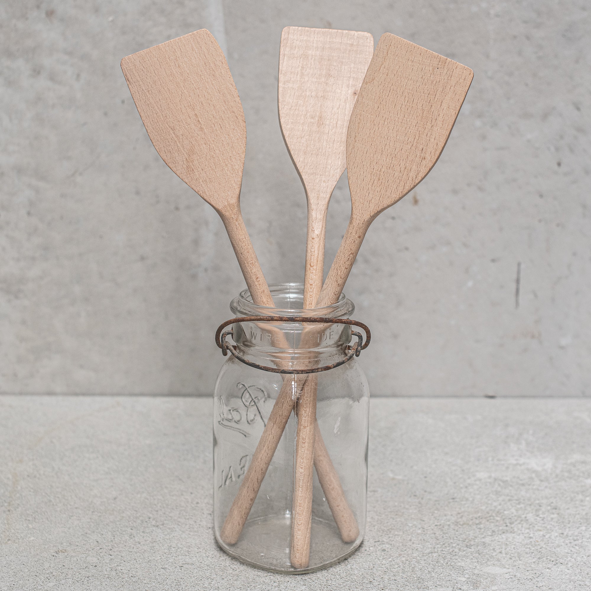 Heaven in Earth German-made wooden round handle spatula stirrer, crafted from high-quality, durable wood with a smooth finish. Ideal for stirring, mixing, and scraping in the kitchen, this eco-friendly tool offers a sleek, functional design that's gentle on cookware and perfect for everyday use