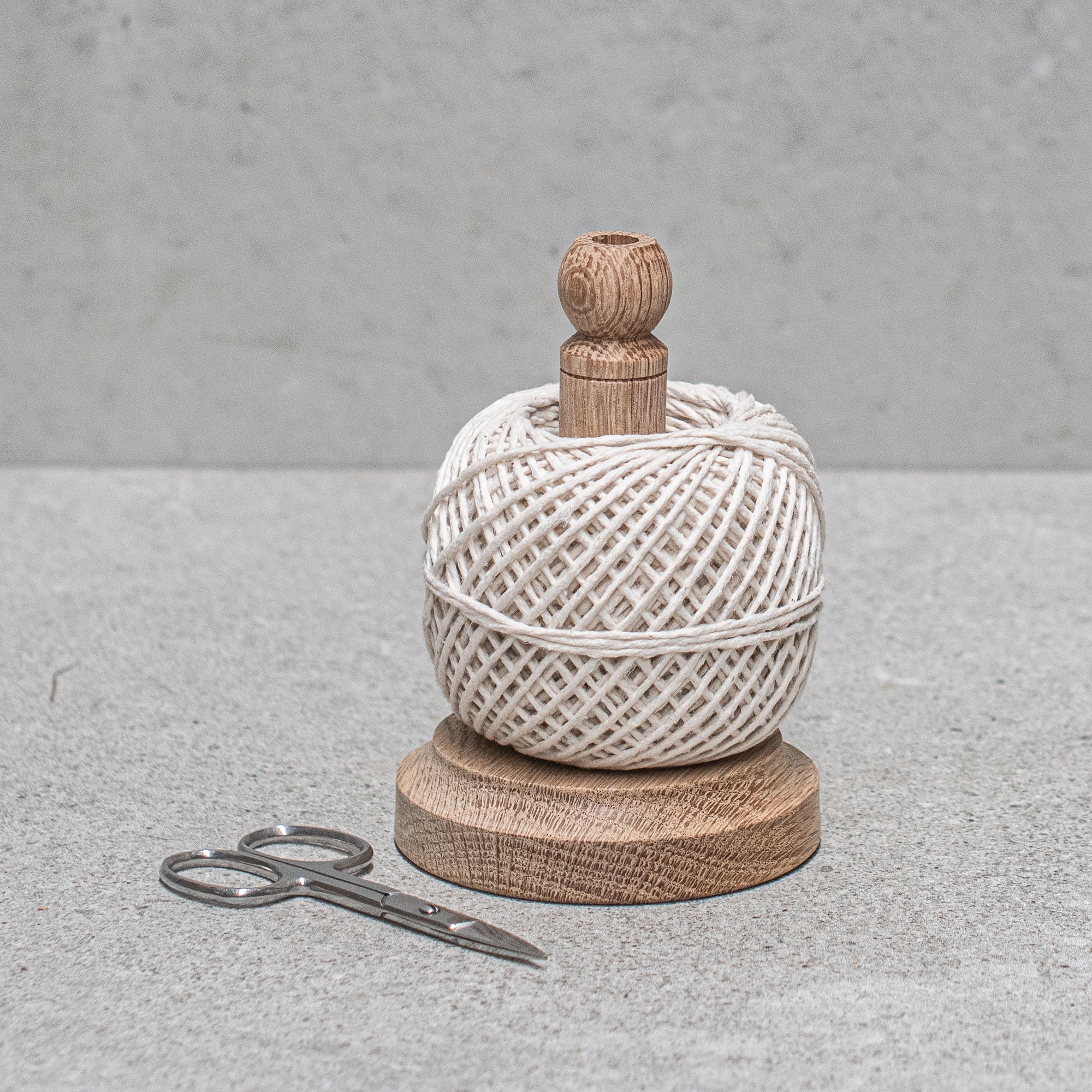 Heaven in Earth String Tidy with Scissors by Creamore Mill, UK. This practical and stylish string holder keeps your twine organised, featuring a sleek design and a pair of scissors for easy cutting. Perfect for crafters and gardeners, adding both function and charm to your workspace.
