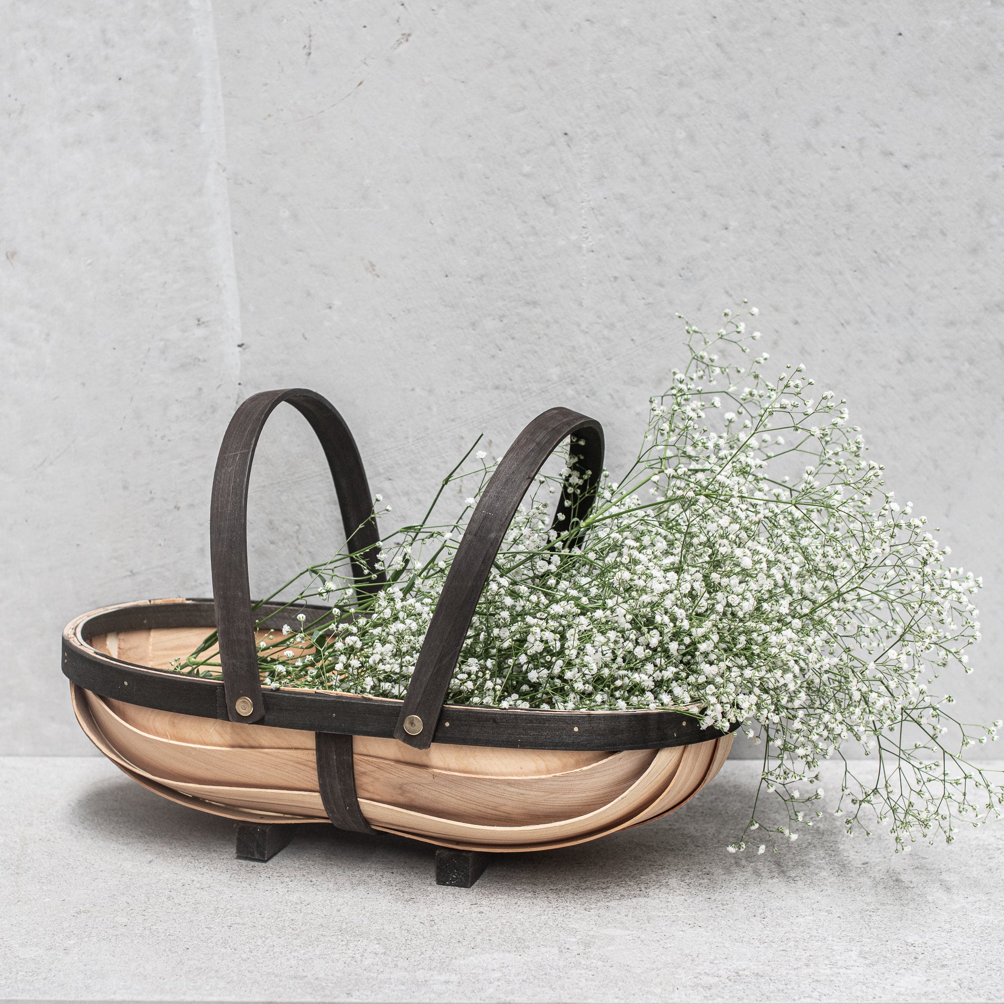 rug Simple by Heaven in Earth, a versatile, eco-friendly carrier perfect for use in the garden or for storing and transporting items. With a sturdy design, it's ideal for gathering produce, flowers etc, adding a rustic yet practical touch to your outdoor activities or home storage