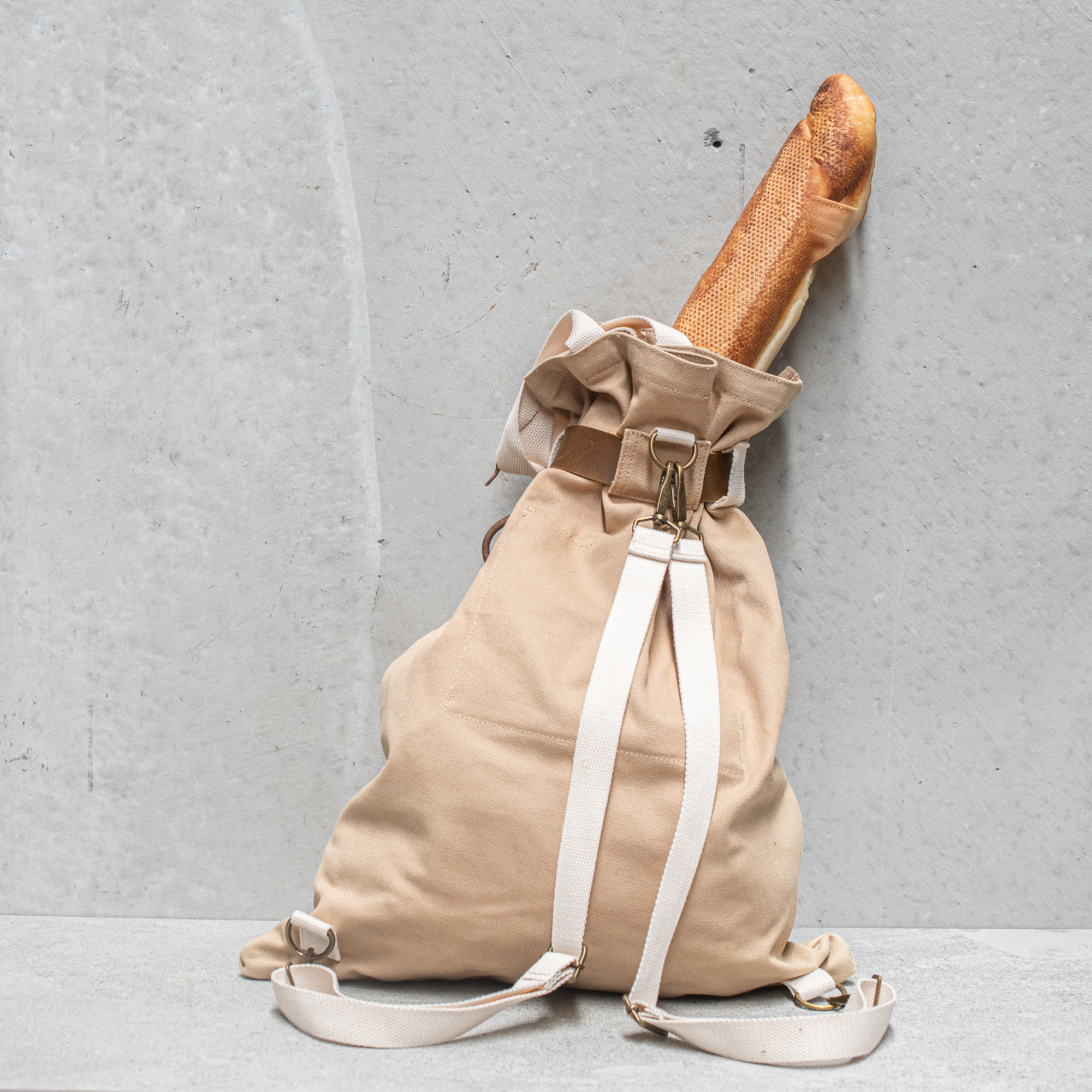 Heaven in Earth carry-all canvas backpack, featuring a spacious design with sturdy straps and a stylish, versatile look, perfect for everyday use or weekend adventures.