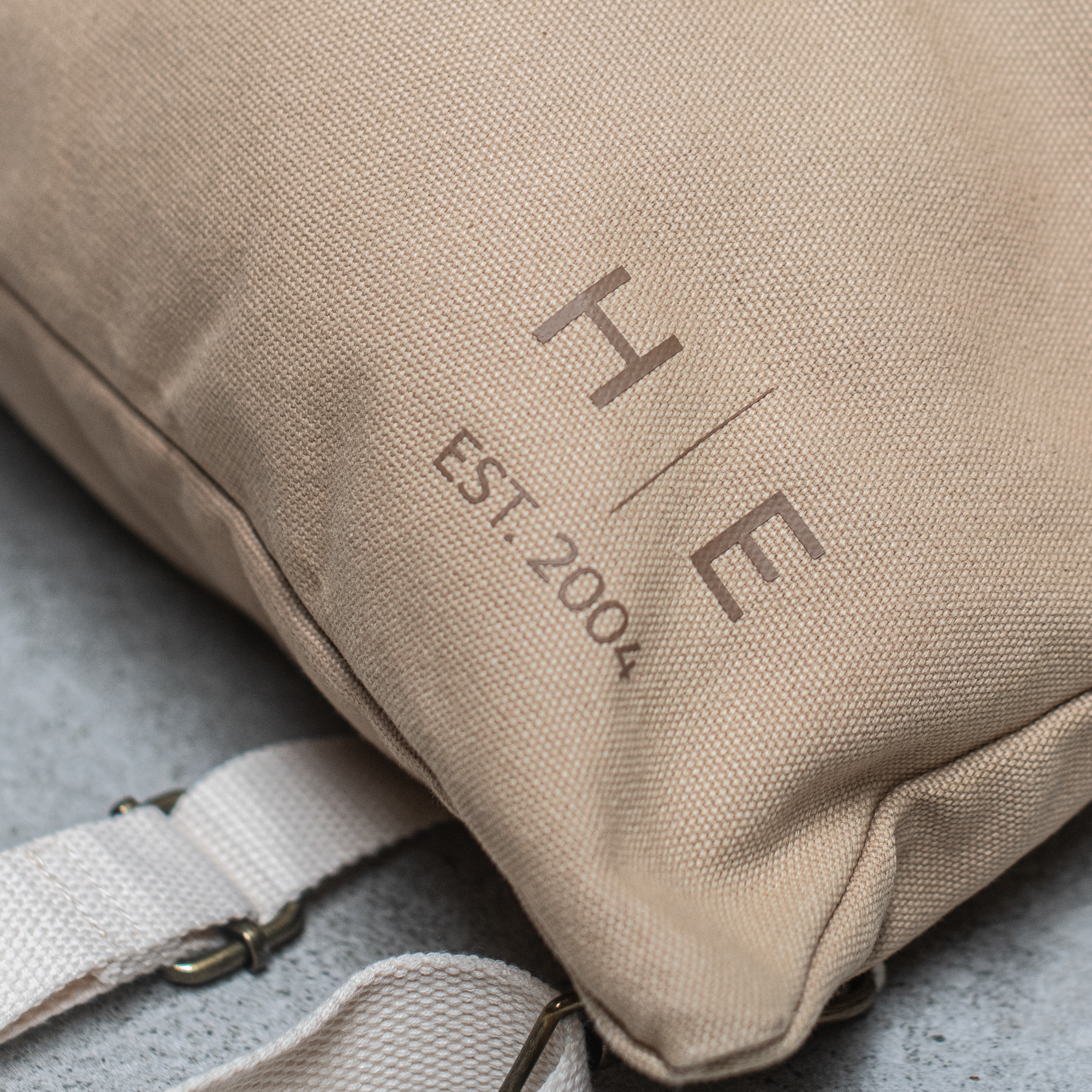 Heaven in Earth carry-all canvas backpack, featuring a spacious design with sturdy straps and a stylish, versatile look, perfect for everyday use or weekend adventures.