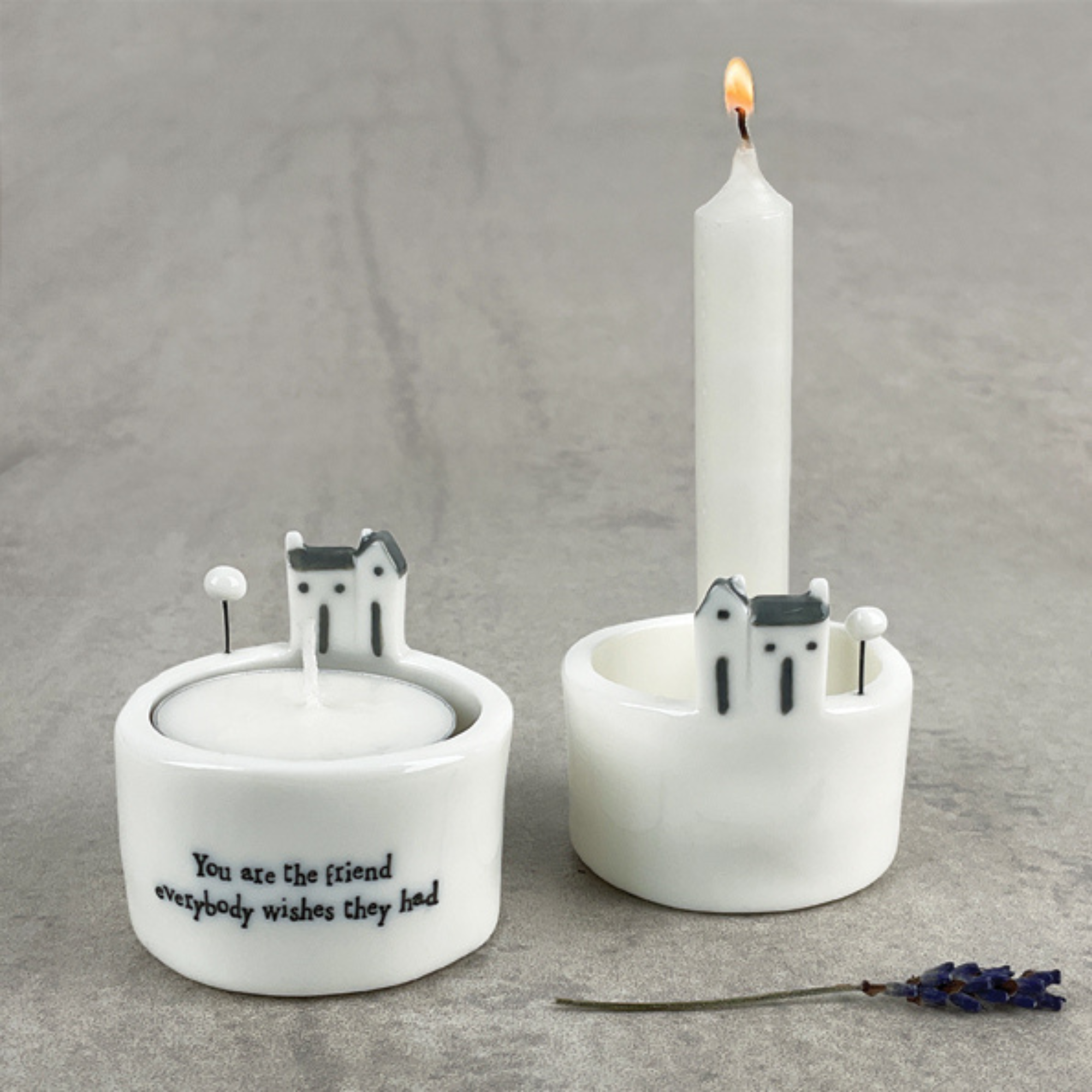 Porcelain candle holders by East of India, UK, featuring a minimalist design with delicate detailing, perfect for creating a warm, ambient glow in any room