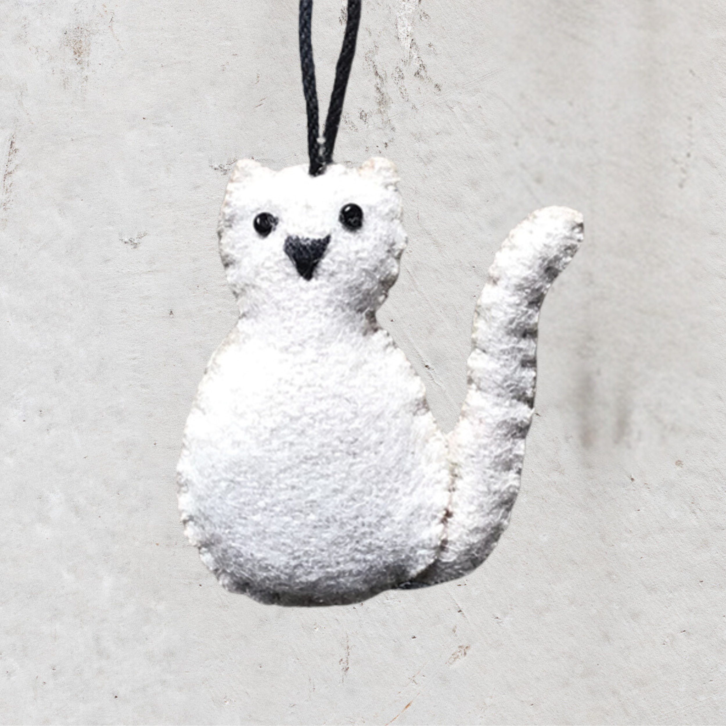 Heaven in Earth (HIE) felt Christmas decorations by East of India, UK, featuring handcrafted, charming designs perfect for adding a cozy, festive touch to your tree or home. Ideal for creating a warm, seasonal atmosphere with eco-friendly materials