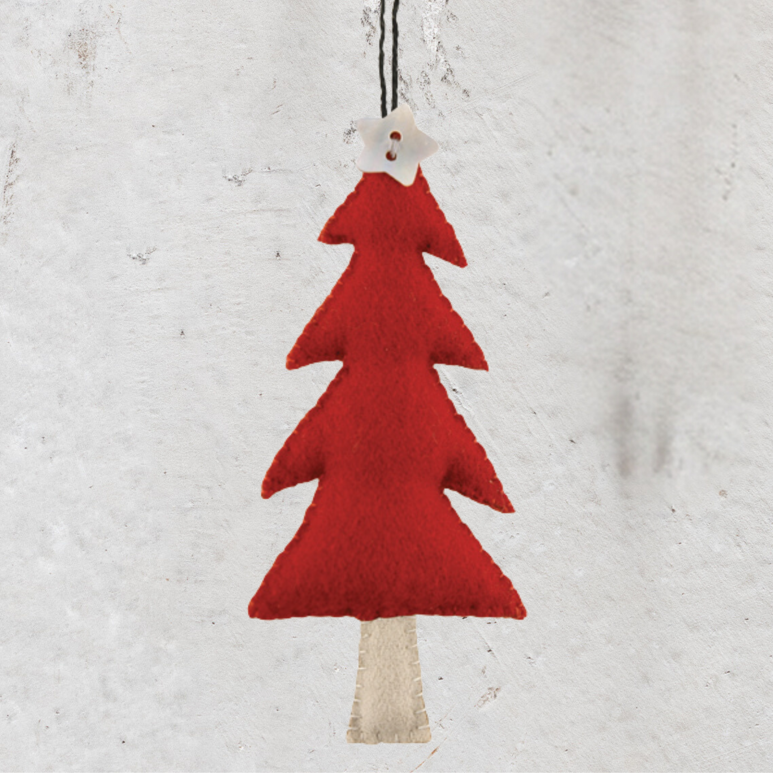 Heaven in Earth (HIE) felt Christmas decorations by East of India, UK, featuring handcrafted, charming designs perfect for adding a cozy, festive touch to your tree or home. Ideal for creating a warm, seasonal atmosphere with eco-friendly materials