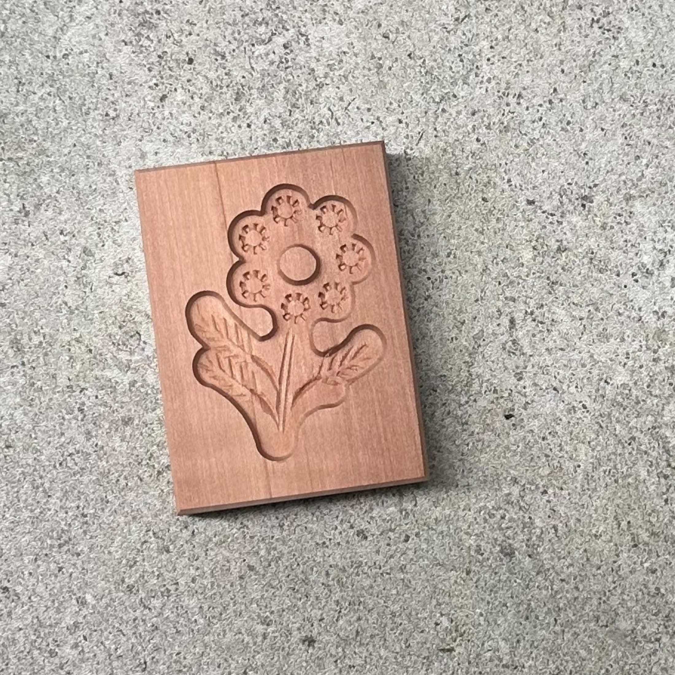 German made Wooden biscuit mould, intricately carved with detailed patterns, perfect for shaping traditional biscuits or cookies with a rustic, homemade touch