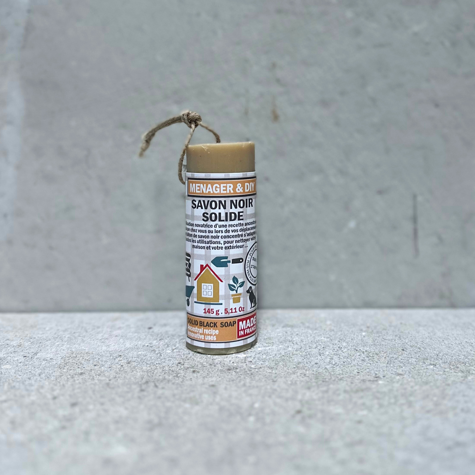 Solid black olive oil soap stick for natural household cleaning by Mas du Roseau, handmade in France.