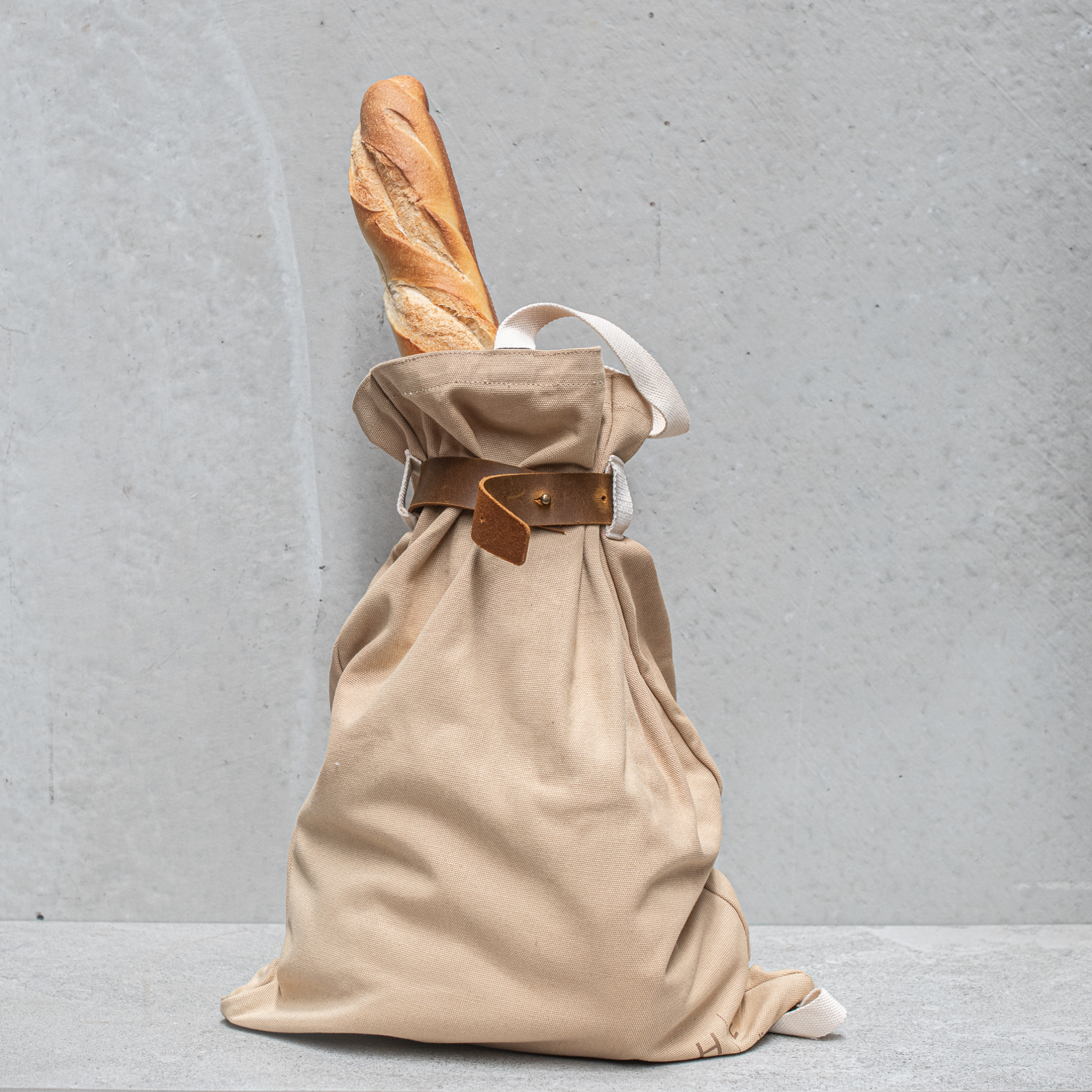 Heaven in Earth carry-all canvas backpack, featuring a spacious design with sturdy straps and a stylish, versatile look, perfect for everyday use or weekend adventures.