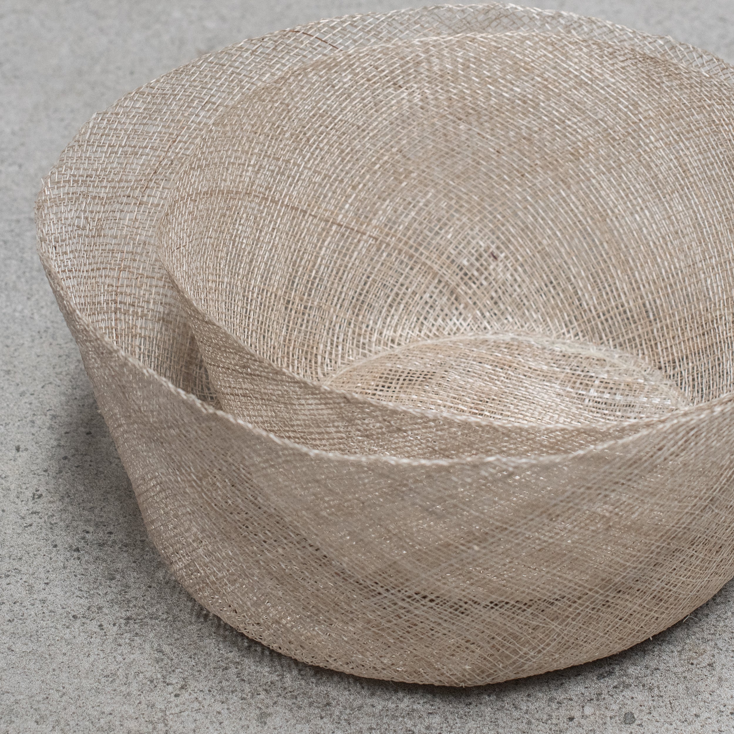 Set of 2 Abaca fibre bowls, featuring a natural woven texture with a rustic, earthy design. Perfect for serving snacks or decorative use