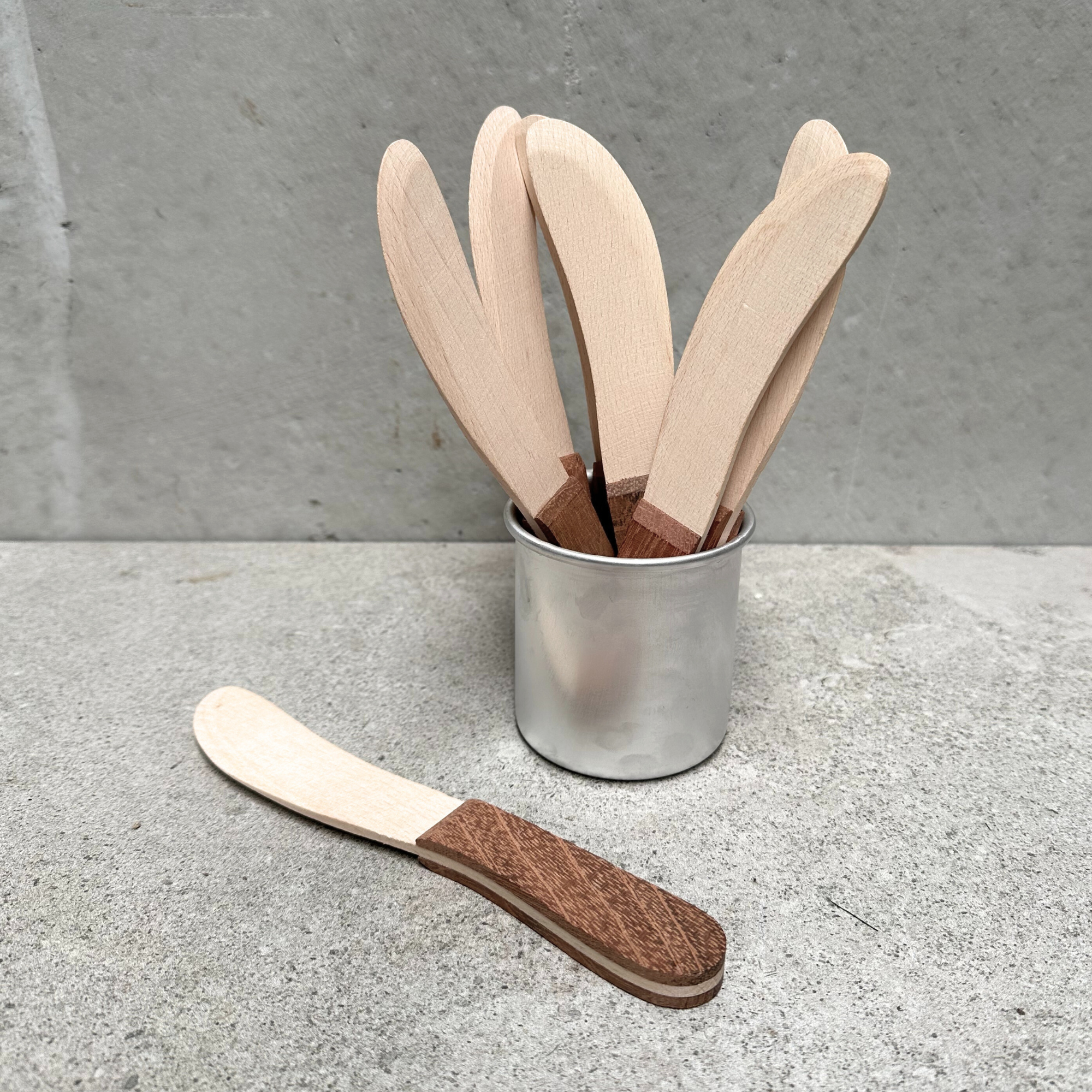 German-made beechwood butter knife, crafted from smooth, durable wood with a simple yet elegant design, perfect for spreading butter without damaging delicate surfaces