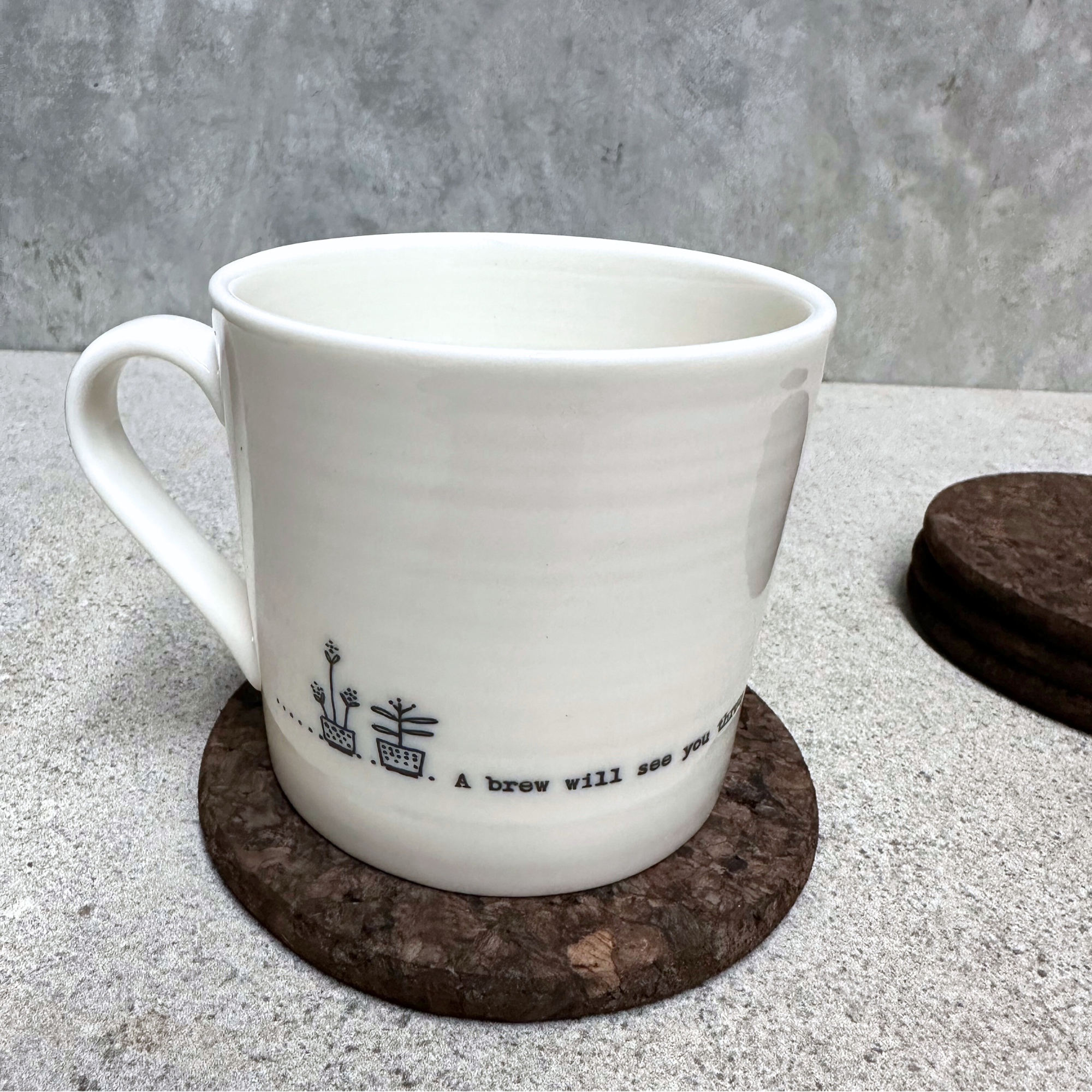 ark round cork coaster by Heaven in Earth, made in Portugal, featuring a smooth, sustainable cork design that protects surfaces while adding a rustic, eco-friendly touch to your table.