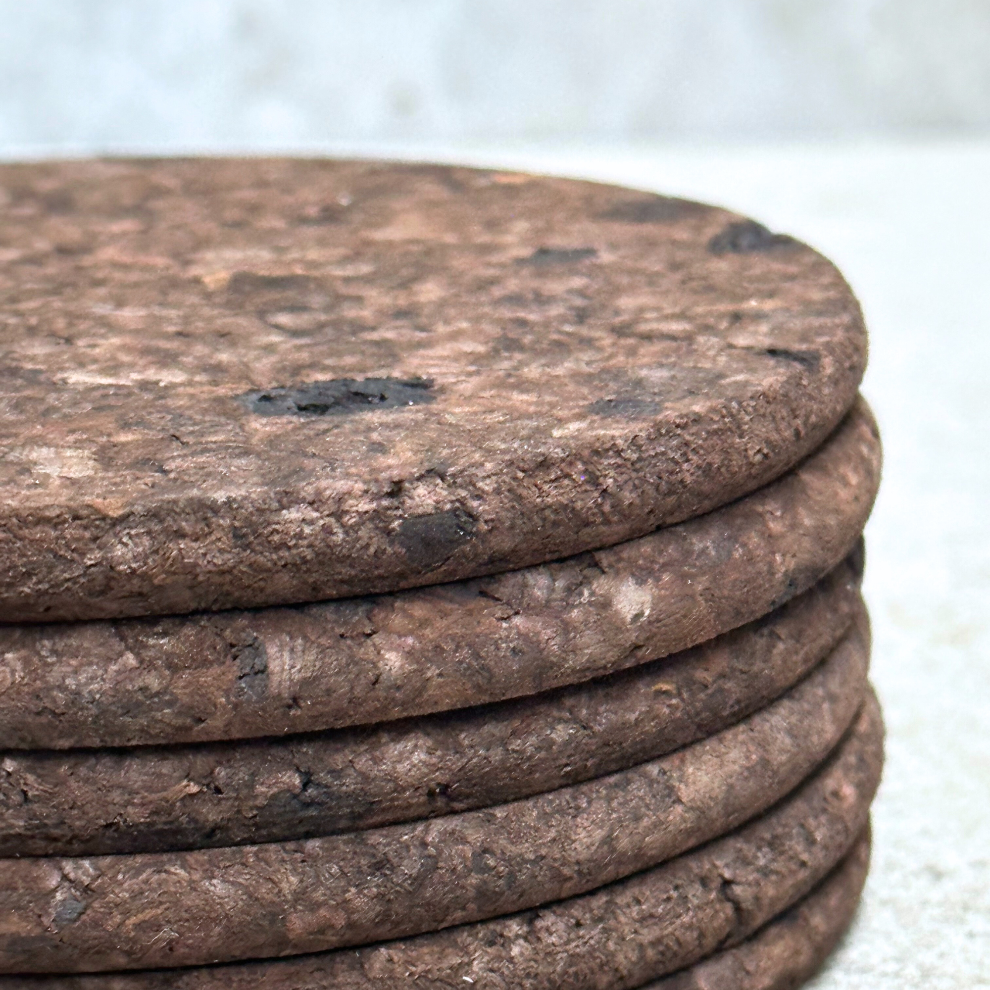 ark round cork coaster by Heaven in Earth, made in Portugal, featuring a smooth, sustainable cork design that protects surfaces while adding a rustic, eco-friendly touch to your table.