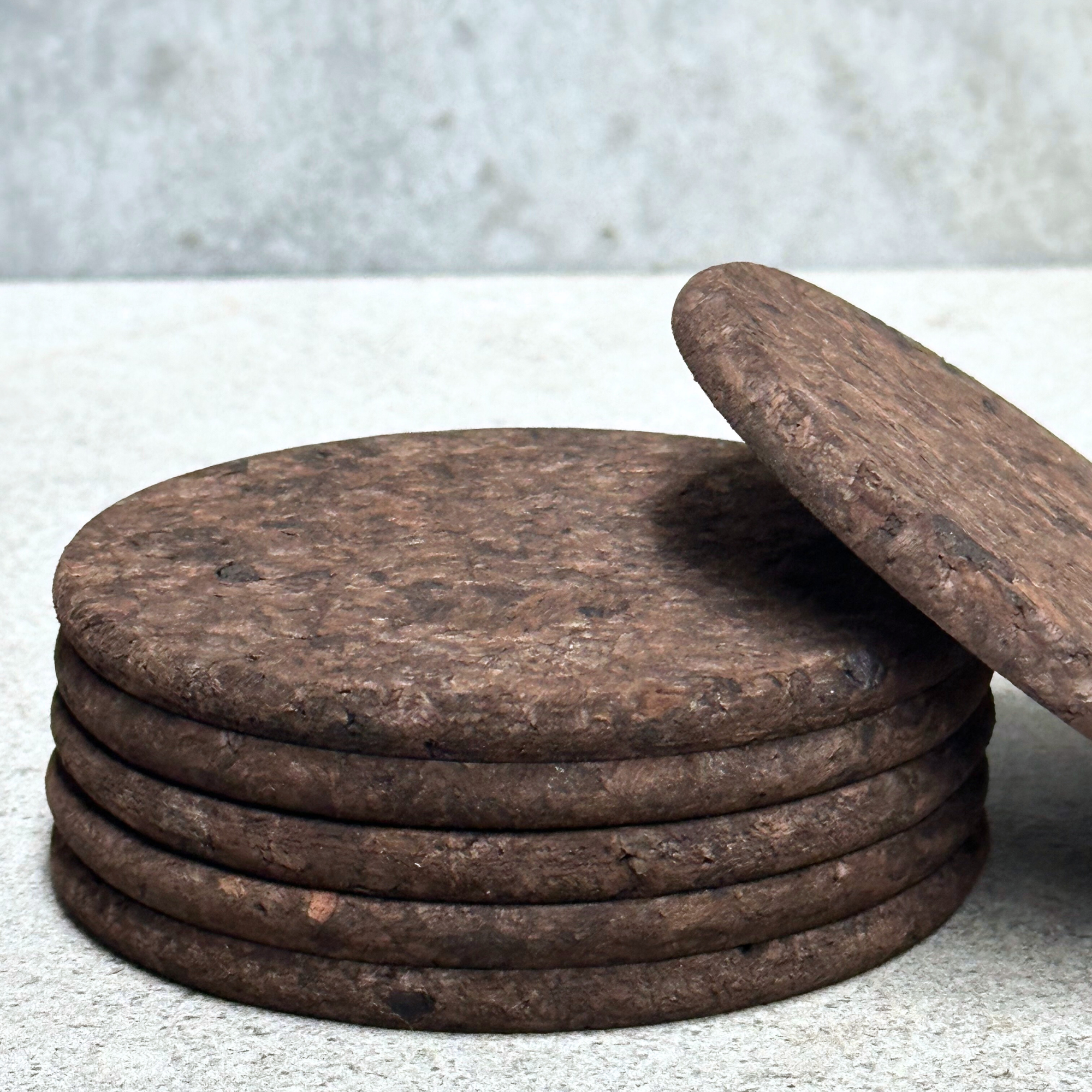ark round cork coaster by Heaven in Earth, made in Portugal, featuring a smooth, sustainable cork design that protects surfaces while adding a rustic, eco-friendly touch to your table.