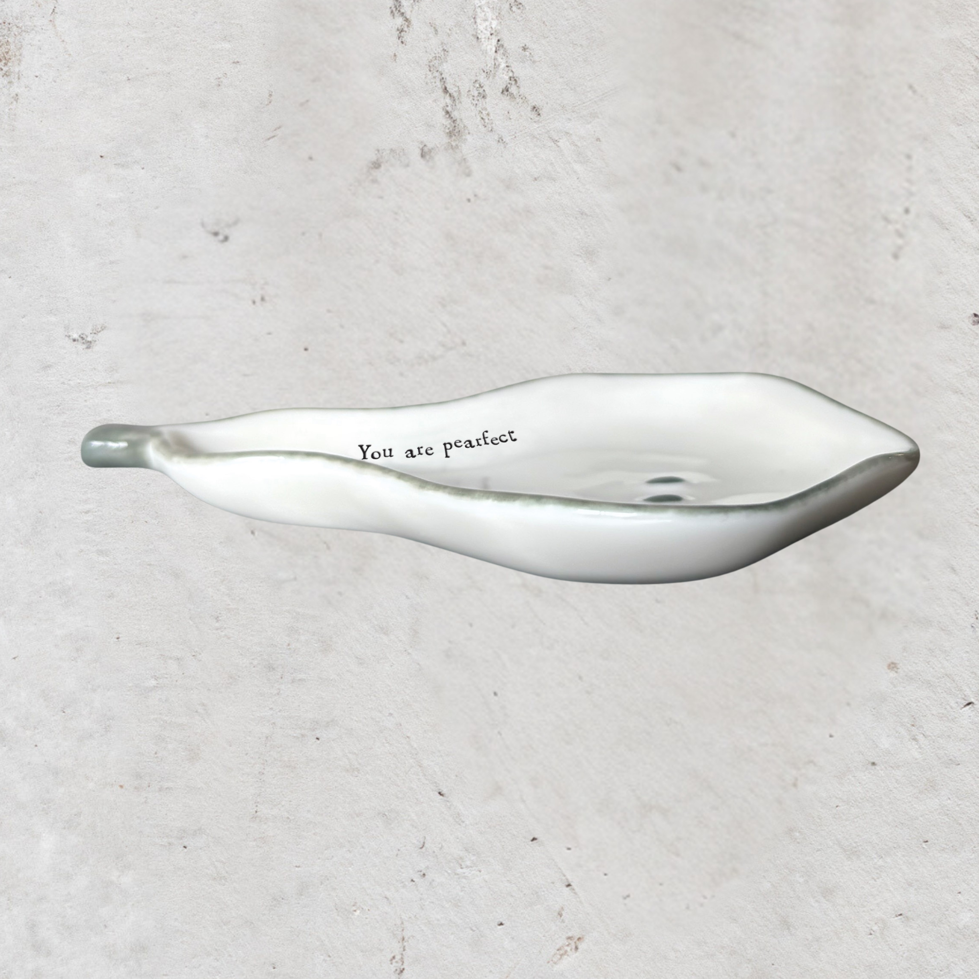 Handmade porcelain pear-shaped trinket dish with heartfelt sentiment in East of India gift box.