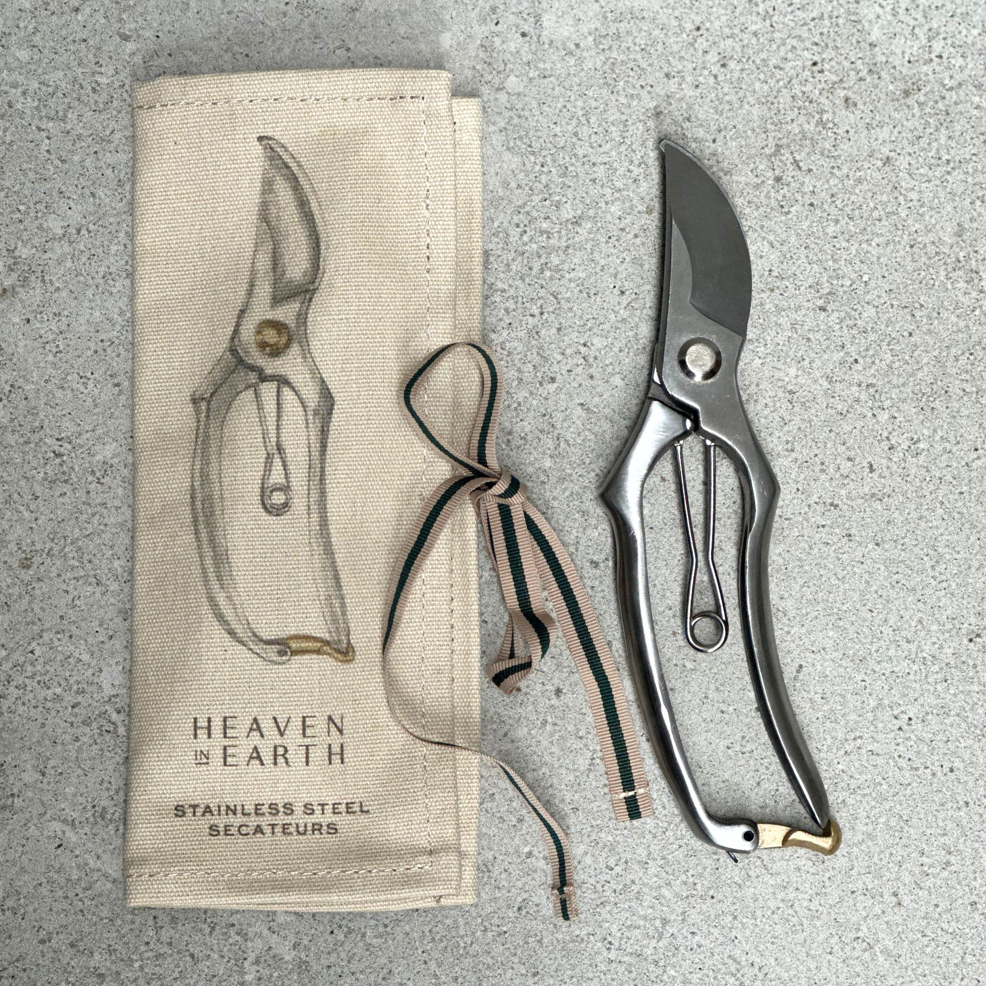Stainless steel garden secateurs presented in canvas wrap for gifting